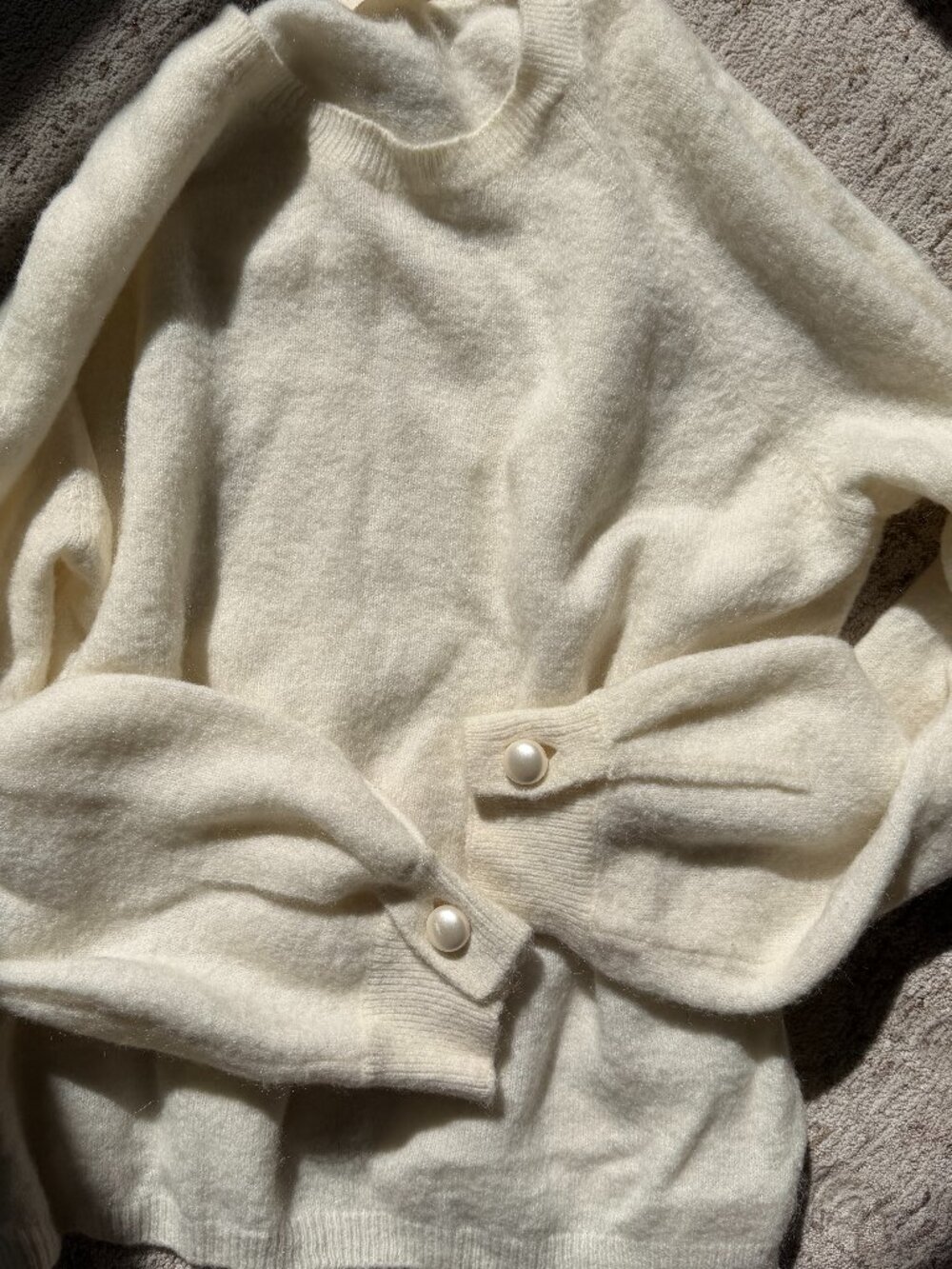 Sezane white sweater with pearl cuff